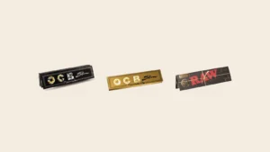 OCB Premium King Size Slim ir OCB Gold Slim popieriukai šalia RAW Black